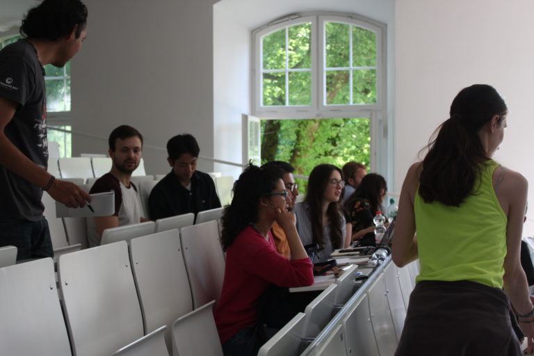 Participants listening to presentation